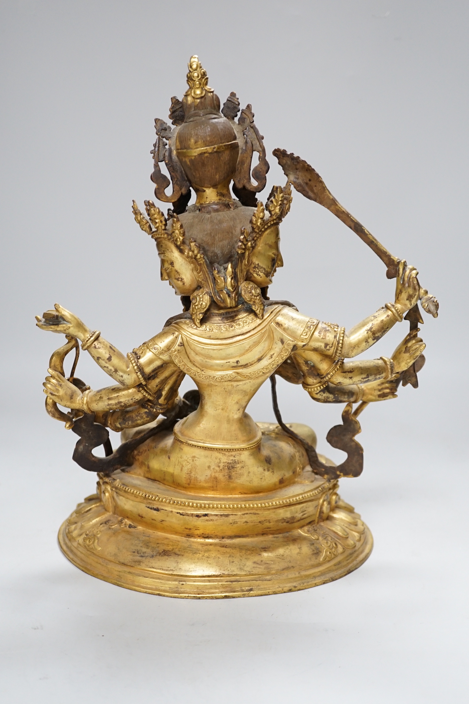 A large Sino Tibetan gilt bronze figure of Avalokiteshvara, 34cm high